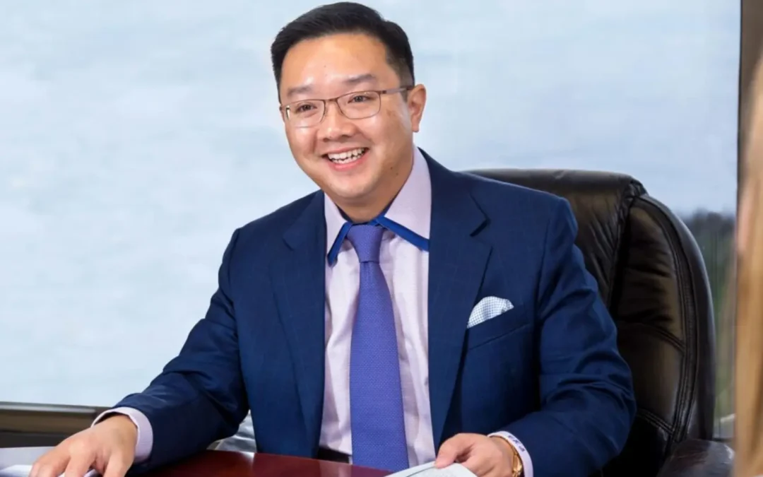 CLAYTON K. SHUM